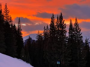Uphill skiing and splitboarding provides opportunities for sunset views and night skiing that aren't normally available to lift riders.