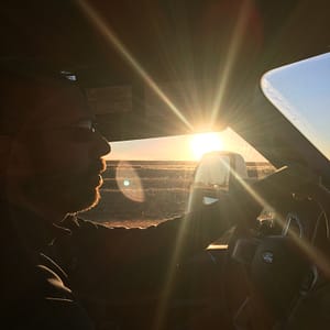 Driving through Texas at sunset