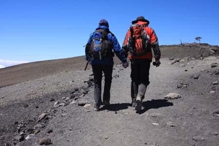 kili_summit Duane and Louellen approaching Uhuru Peak, Mt. Kilimanjaro, Tanzania.